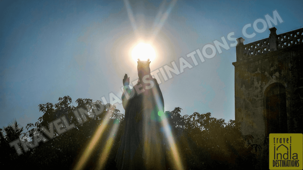 Setting sun over Christ the King statue