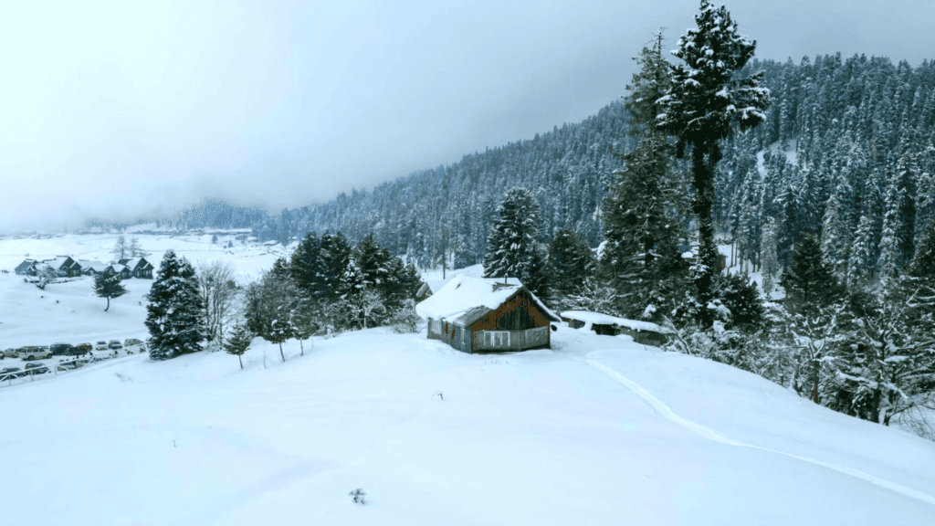 A wooden cottage in winter in Gulmarg, Kashmir
