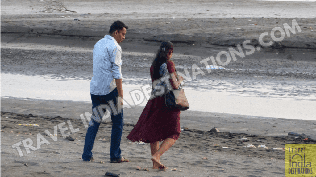 Couple Walking at Suruchi Beach