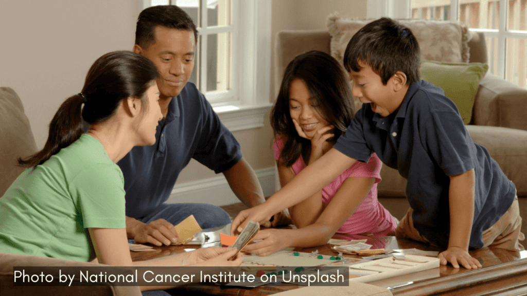 a family playing boardgame together