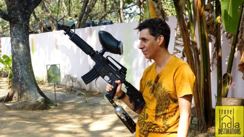 a person trying paint ball gun