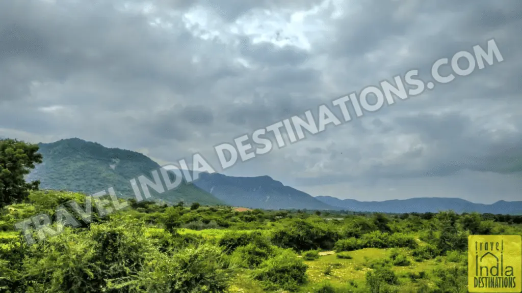 a landscape view of the scenery from the train to Udaipur