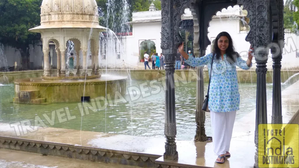 sarah standing inside one of the pavilions at Saheliyon ki Bari