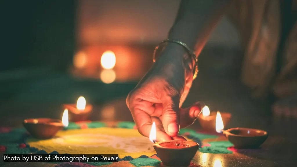 lighting diyas on festivities in India