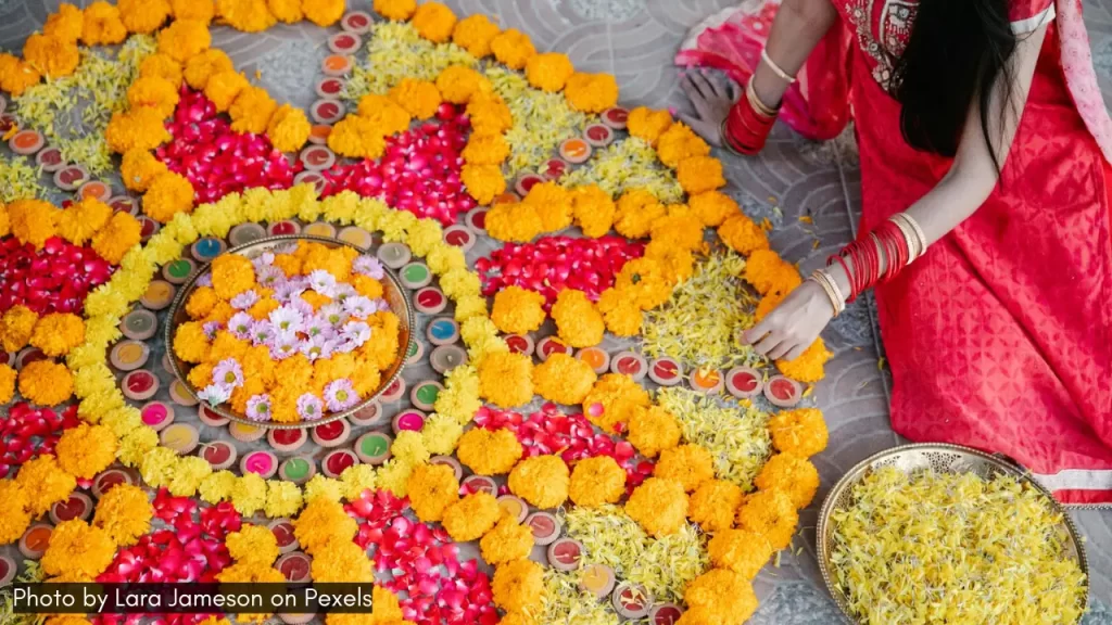 girls celebrate navratri with rangoli designs