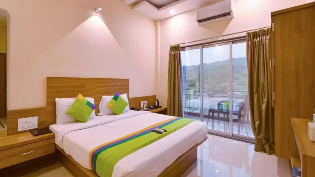 a standard room at the treebo winter town venna lake one of the budget hotels in mahabaleshwar