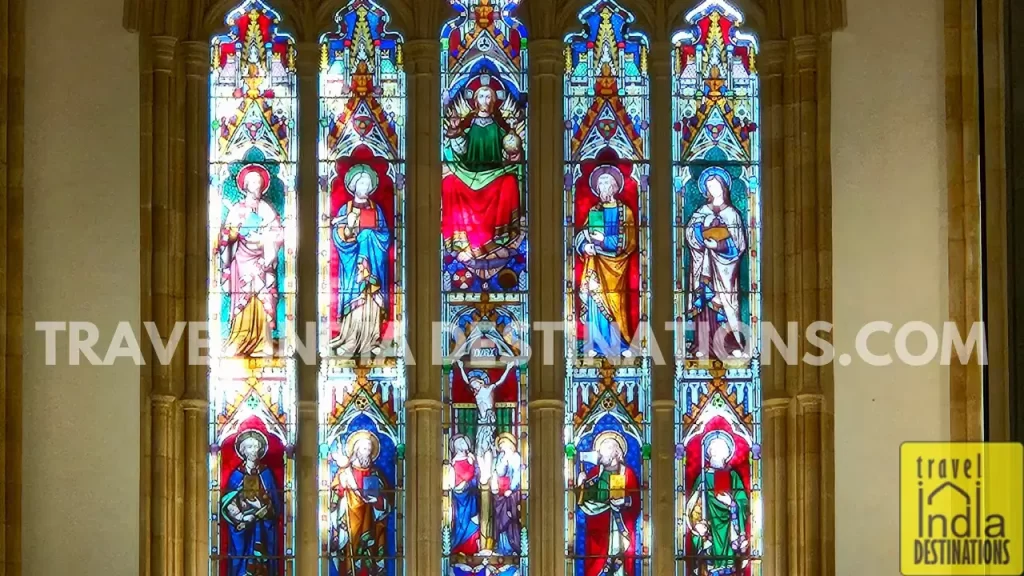 a close up of the stained glass above the altar in afghan church in mumbai