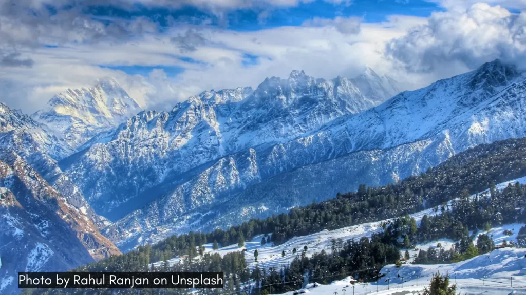 snowy mountains in auli uttarakhand is one of the best places to visit in january in india