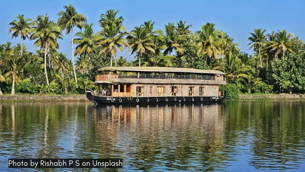 an image of houseboat in the backwaters of kumarakom kerala