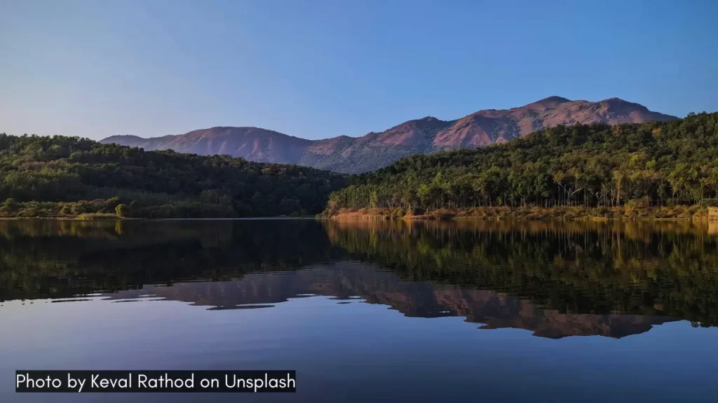 a serene view of Hirekolale Lake in Chikamagalur (Chikkamaguluru), one of the best towns with lakes in India
