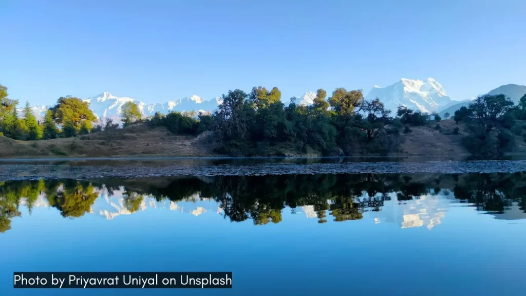 a view of Deoria Tal near Chopta in Uttarakhand with Chaukhamba peaks, one of the lesser known lake towns in India
