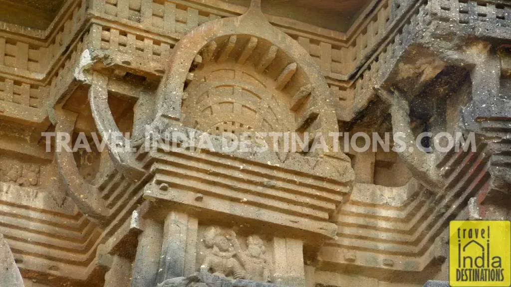 Close-up of intricate carvings on the exterior of the Chaitya Hall at Bhaja Caves.