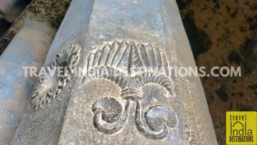 Close-up of pillar carvings at the entrance of the Chaitya Hall in Bhaja Caves.