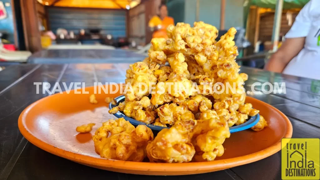 An image of freshly fried corn pakodas at Tiger Point Lonavala