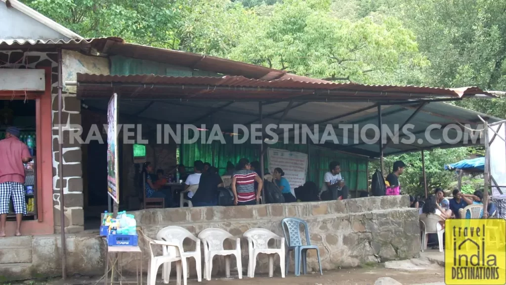 A group of hikers lounging at the local eatery at Lohagad Fort base village.
