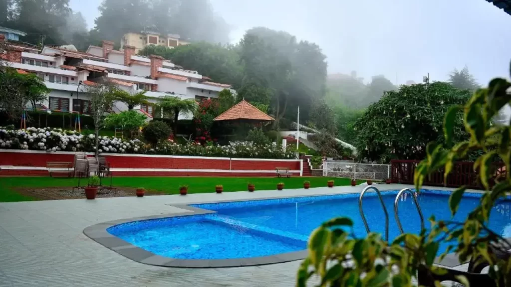 A shot of Kodai Resort Hote with outdoor swimming pool one of the hotels near Kodaikanal Lake