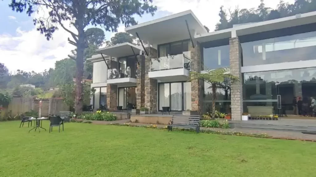 A shot of Mountain Retreat Hotel with balconies facing the Kodaikanal Lake