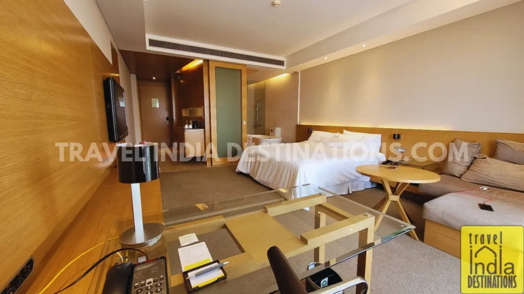 A wide angle window view of the King Room at Westin Mumbai Garden City.