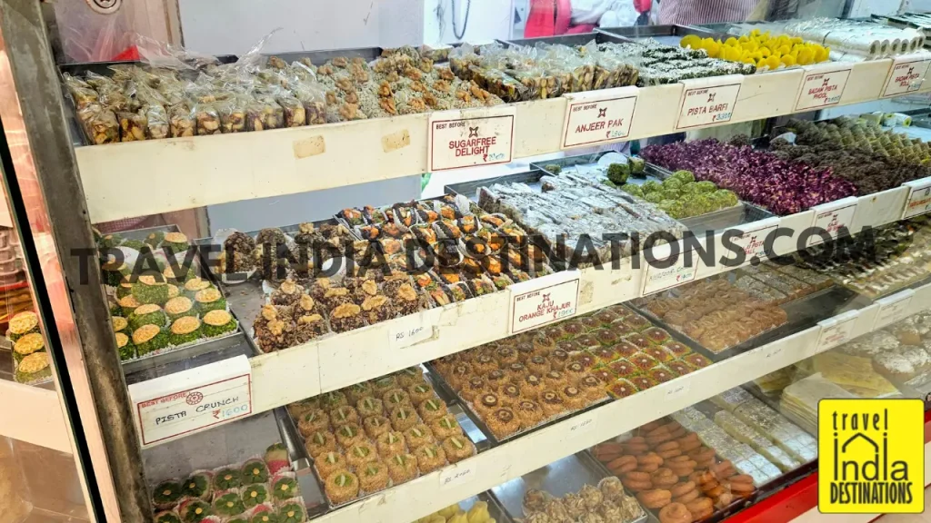 Interior of Tewari Bros Mithaiwala in Mumbai showing colorful mithai and Indian sweets on display, perfect for Diwali, weddings, and festive celebrations.