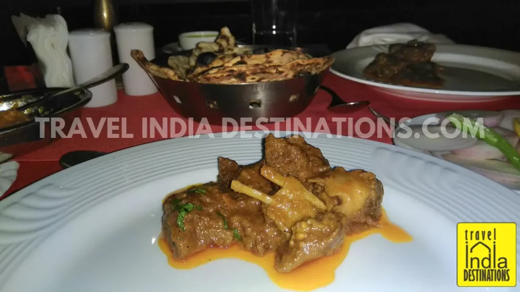 A picture of Dhungar Maas with Naan, one of the chef's special items at Upre by 1559 AD.