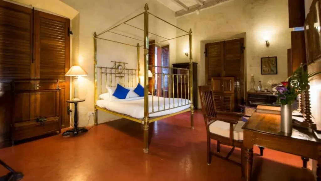 Interior view of a heritage room at Dune L'Orient, one of the best beach hotels in Pondicherry.