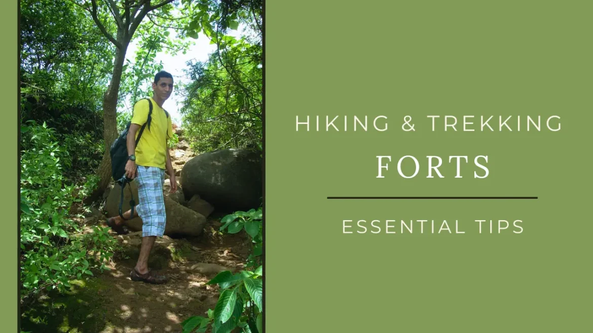 Hiker walking on a stone-filled trail through lush greenery, exploring forts in India
