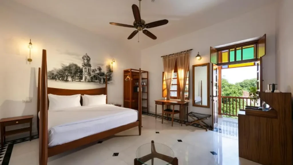 Simple boutique-style room at Grand Hotel D'Europe near the beach in Pondicherry.