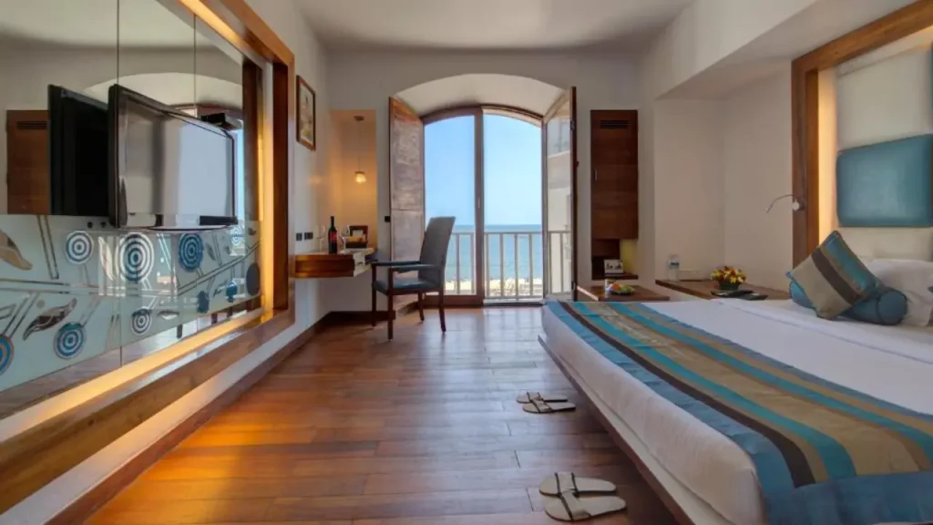 An elegant modern and minimal sea-facing room at The Promenade, one of the beachfront hotels in Pondicherry.