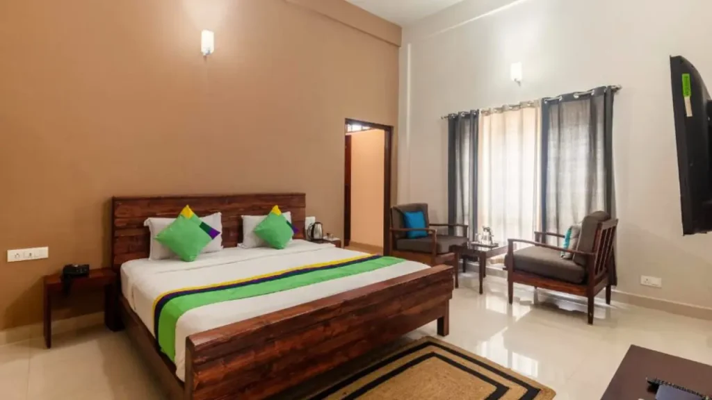 A picture of Deluxe Double Room at Treebo Vrindavan one of the best budget hotels in Madikeri Coorg.
