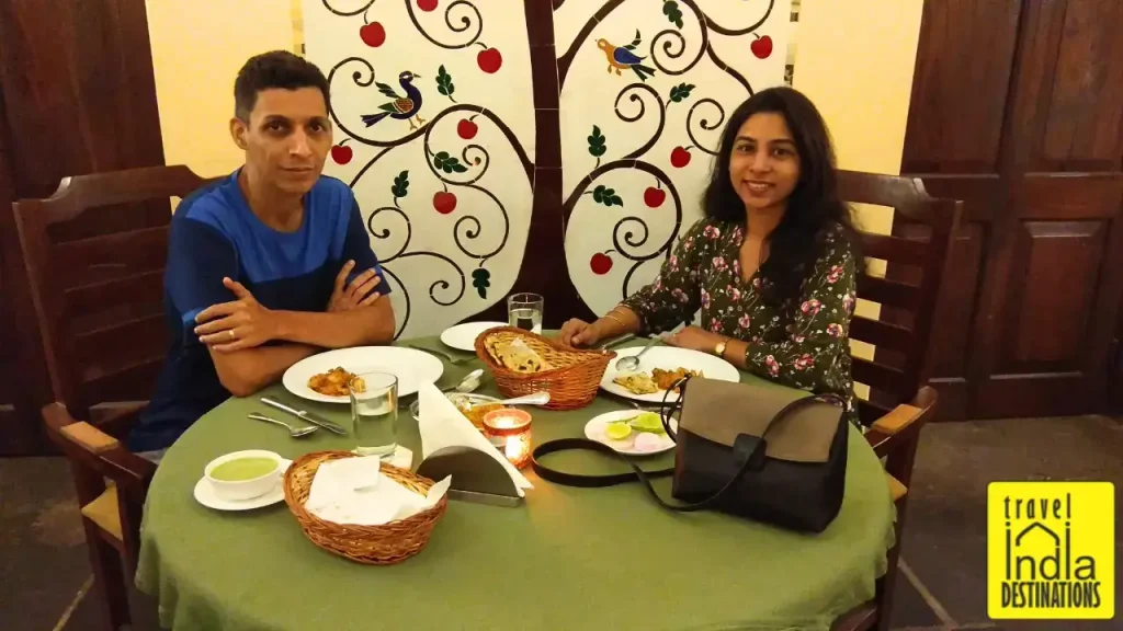 An image of couple having dinner at 1559 AD restaurant in Udaipur.