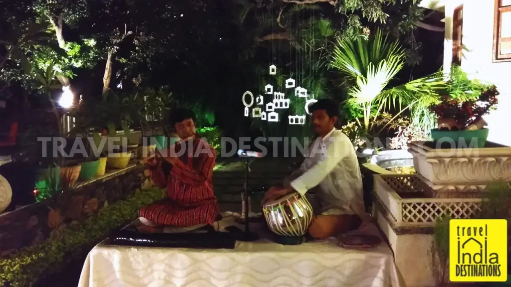 A picture of local musicians playing soft Indian live music at 1559 AD Udaipur.