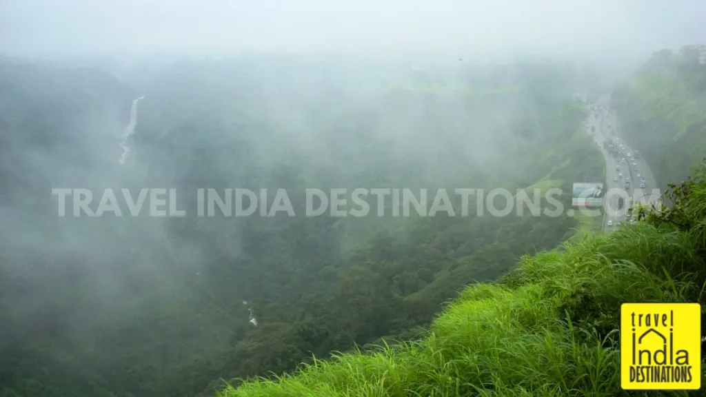 A scene of misty Khandala Ghat in Maharashtra during the monsoon season from Rajmachi Point.