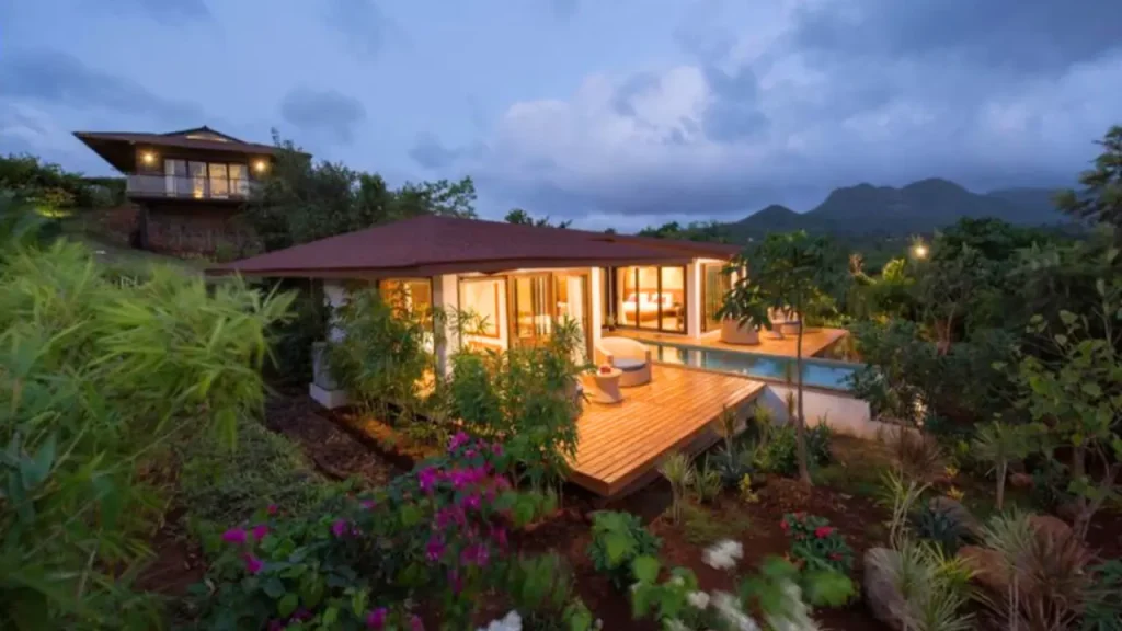 A shot of luxury villa at Resort Amanzi with surrounding garden, one of the best hotels for couples in Lonavala.