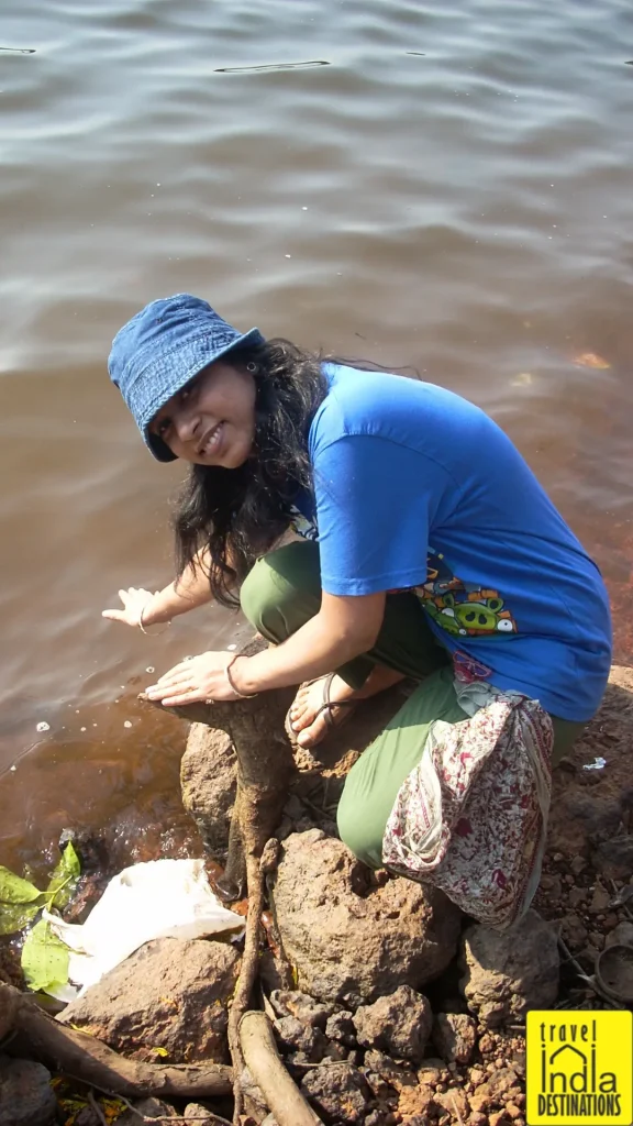 A woman posing for the camera around Venna Lake in Mahabaleshwar.