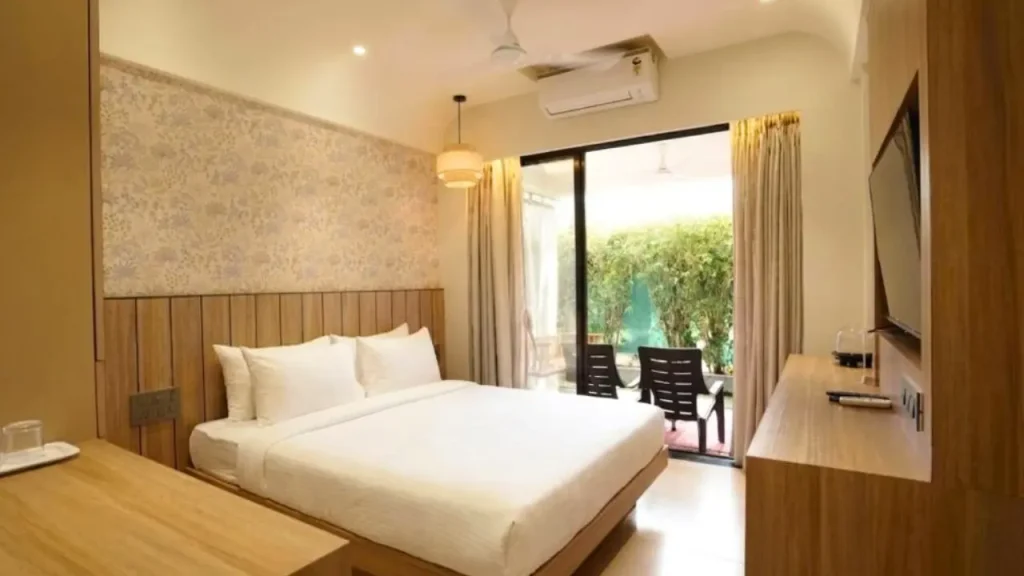 Cozy interiors at Bougainvillea Boutique Beach Hotel with private balcony, one of the best hotels for couples in Alibaug.