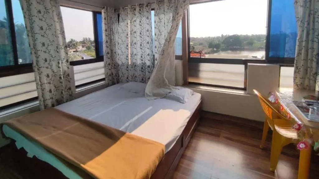 Simple interiors at Diamond Cottage Homestay with lake views, one of the best budget hotels in Alibaug.