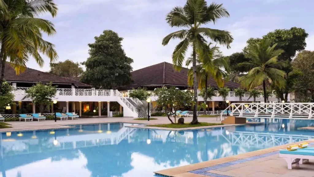 A shot of outdoor pool at Novotel Goa Dona Sylvia, one of the best family resorts in Goa.