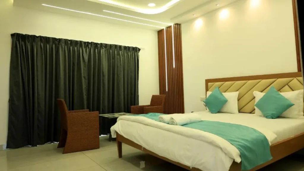 Simple and elegant room interiors at Prasanna Beach Resort, one of the best beach hotels in Alibaug.