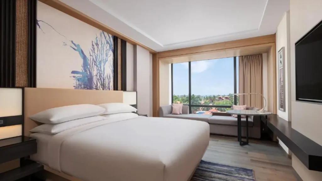 Cozy interiors of Deluxe Guest Room at the Courtyard by Marriott in Colva South Goa.