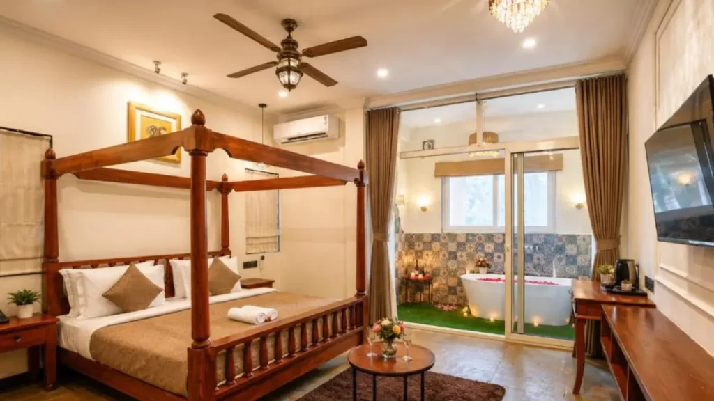 Cozy interiors of King Suite with Bath Tub at Dimaru Boutique Hotel located in Calangute, North Goa.