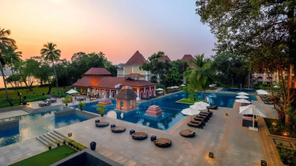 Lavish swimming pool area at Grand Hyatt, one of the best luxury family resorts in North Goa.