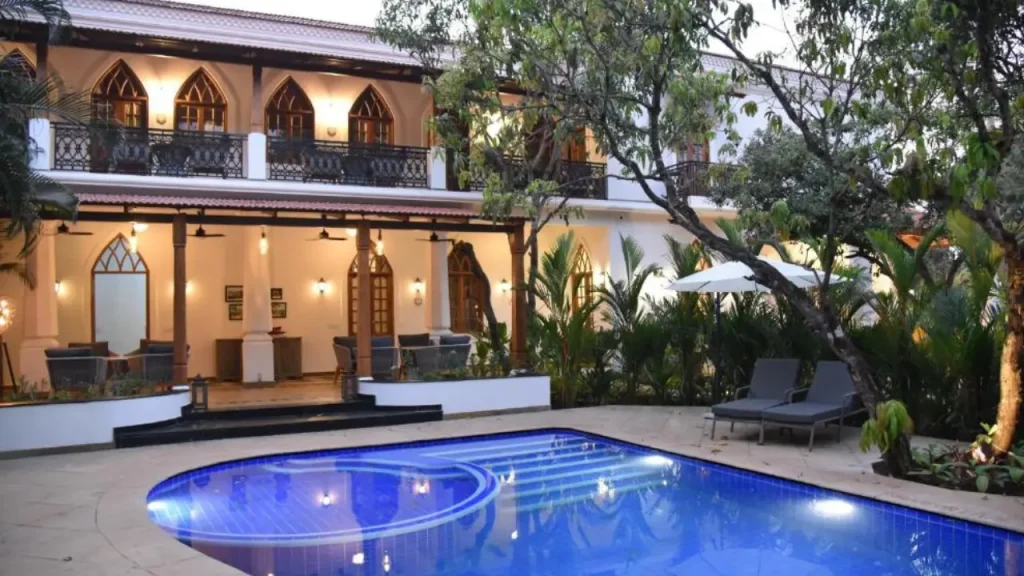 View of inner courtyard and swimming pool at The Postcard Saligao one of the best hotels for couples in Goa.