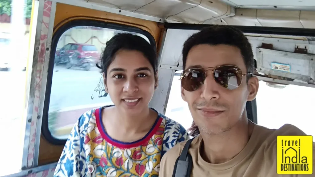 A selfie of a couple in a shared autorickshaw in Udaipur, India.
