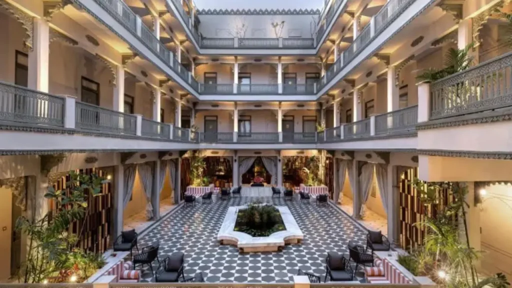 Stylish courtyard of Manuscript Jhilwara Haveli, one of the best boutique heritage hotels in Udaipur near City Palace.