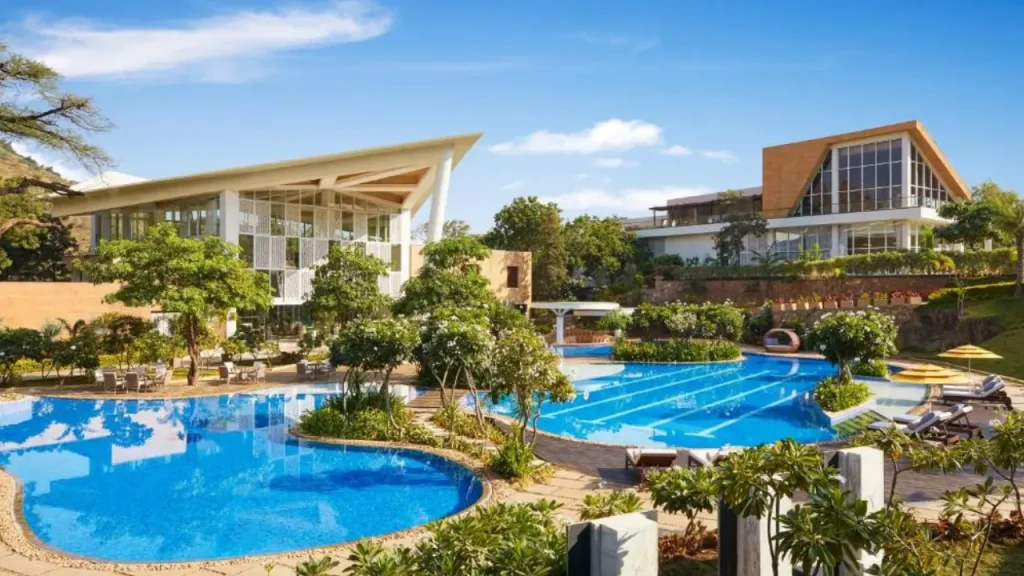 A shot of outdoor swimming pools at Taj Aravali Resort & Spa, one of the best resorts in Udaipur.