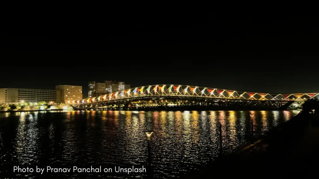 A shot of Atal Bridge in Ahmedabad lit up during night time.
