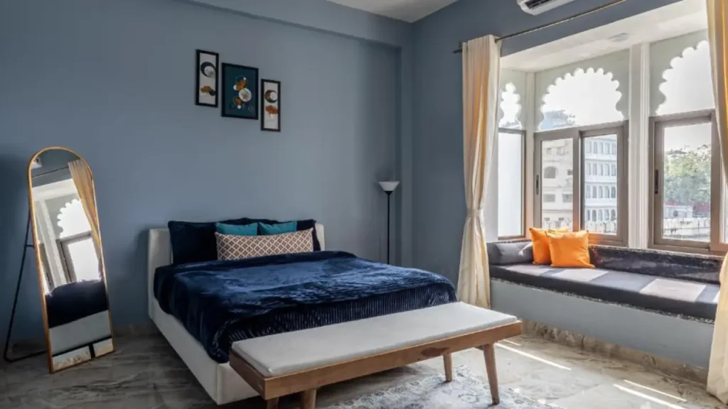Cozy interiors of Superior Lake View Room at Footprint By The Lake, one of the best hostels and budget hotels in Udaipur.
