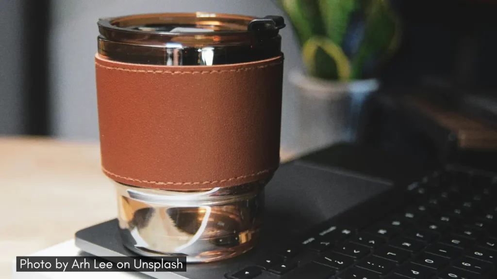 A shot of insulated travel mug on a laptop makes an ideal Diwali gift for those who lead a busy lifestyle.