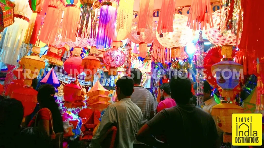 people buying Diwali lanterns at a shop before the festival.